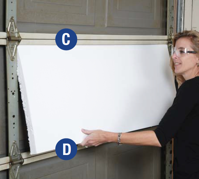 6:  Insert the insulation sheet between horizontal rails C and D with the channeled or grooved side facing the garage door.